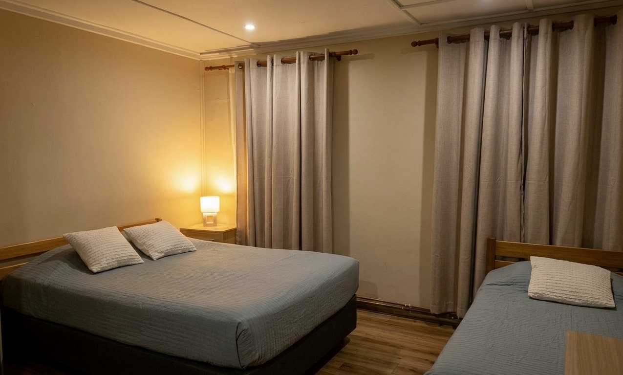 Habitación del Hotel Villa Alemana con dos camas